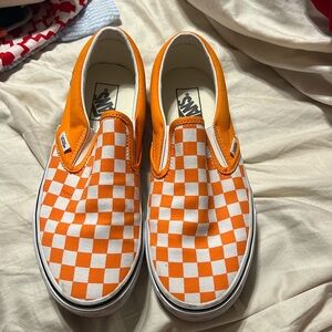 Orange and white Vans